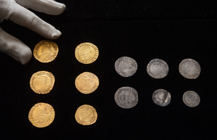 The couple discovered a hoard of gold and silver coins from the 17th century. They sold it for nearly two million